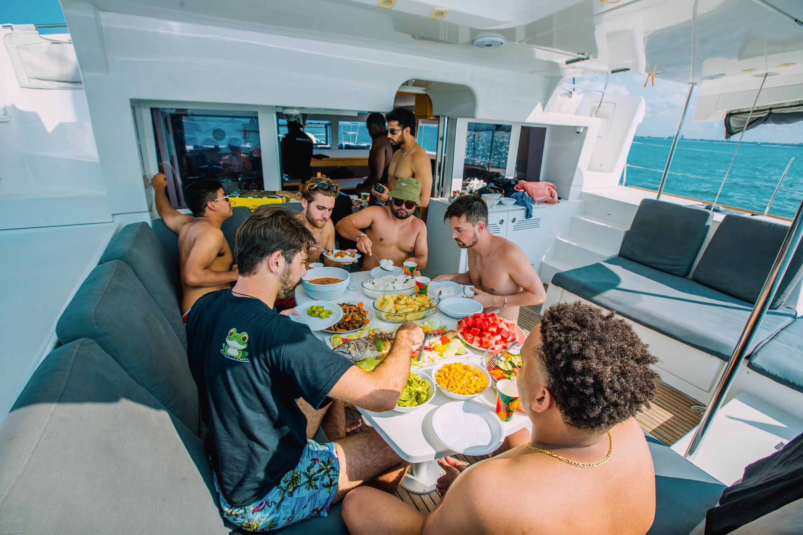 On-board chef plating the spread
